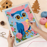 Punching the Rosy Blue Owl design with the punch needle