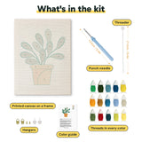 What is in the Round Leaf Plant kit: printed canvas, punch needle, threader, threads, color guide and hangers