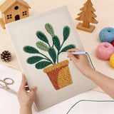 Punching the Round Leaf Plant design with the punch needle