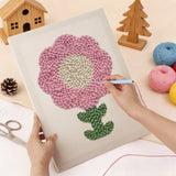 Punching the Round Pink Bloom design with the punch needle