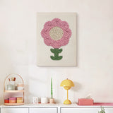 Finished Round Pink Bloom punch needle canvas on a wall
