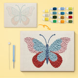 Ruby Wing Butterfly canvas before and after punching, with the threads and tools