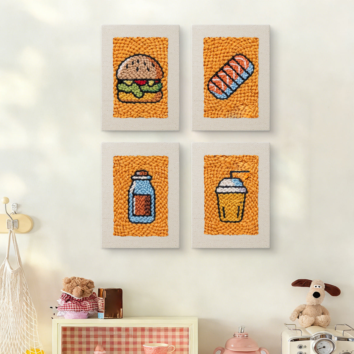 The four Salmon Sushi Lunch mini canvases on a wall above a shelf