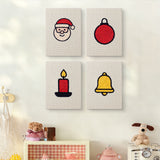 The four Santa and Candle mini canvases on a wall above a shelf