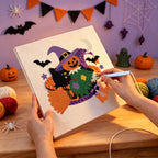 Punching the Scarecrow on a Broom design with the punch needle