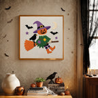 Finished Scarecrow on a Broom punch needle canvas on a wall