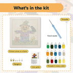 What is in the Scarecrow on the Hill kit: printed canvas, punch needle, threader, threads, color guide and hangers