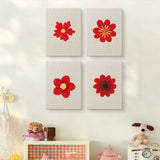 The four Scarlet Flower Heads mini canvases on a wall above a shelf