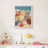 Finished Seashell Beach punch needle canvas on a wall