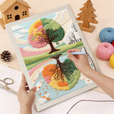 Punching the Seasons Tree Lake design with the punch needle