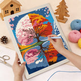 Punching the Seasons Tree Mirror design with the punch needle