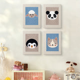The four Sheep and Panda mini canvases on a wall above a shelf