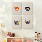 The four Siamese and Tuxedo mini canvases on a wall above a shelf