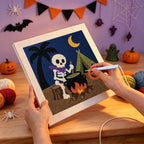 Punching the Skeleton Camp Cook design with the punch needle