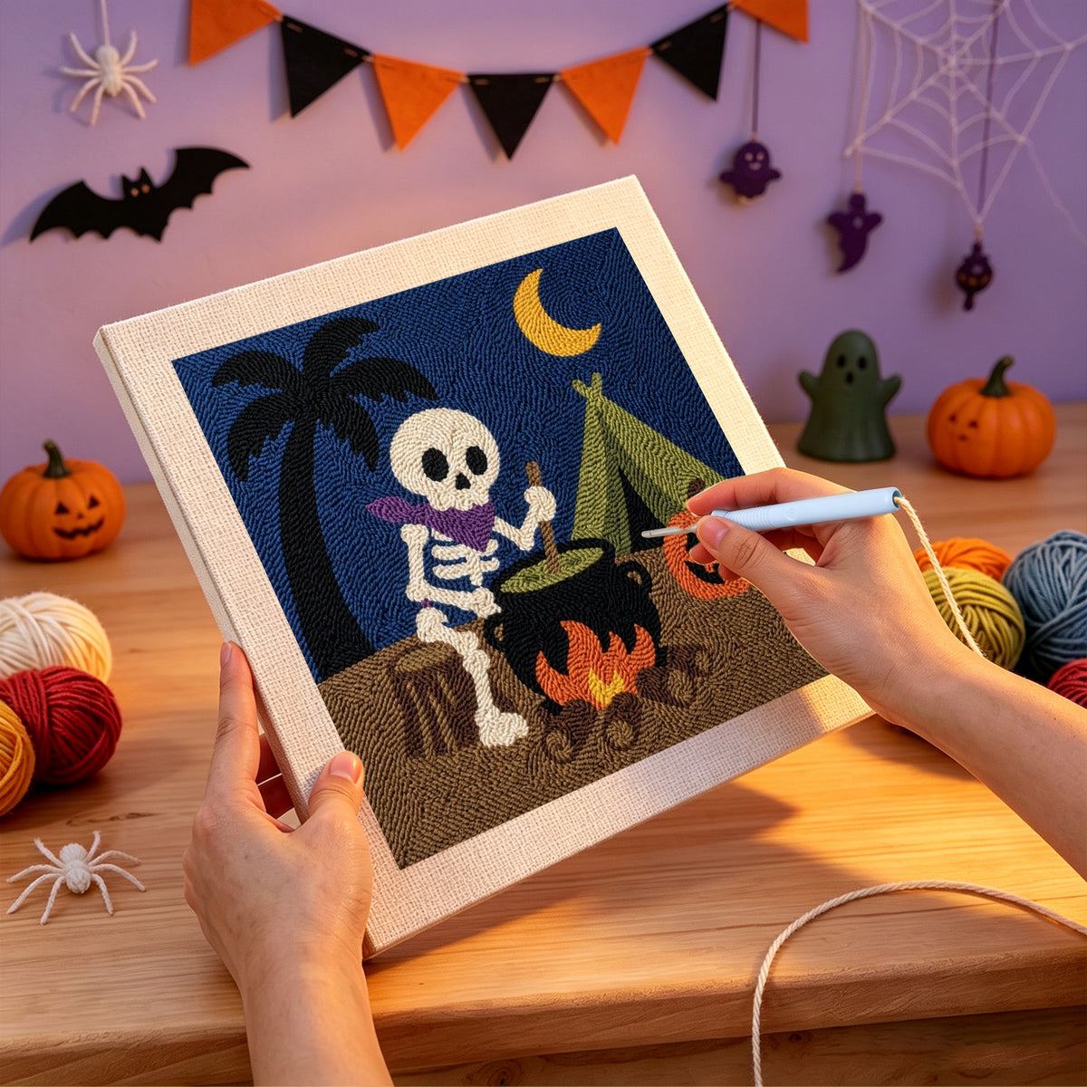 Punching the Skeleton Camp Cook design with the punch needle