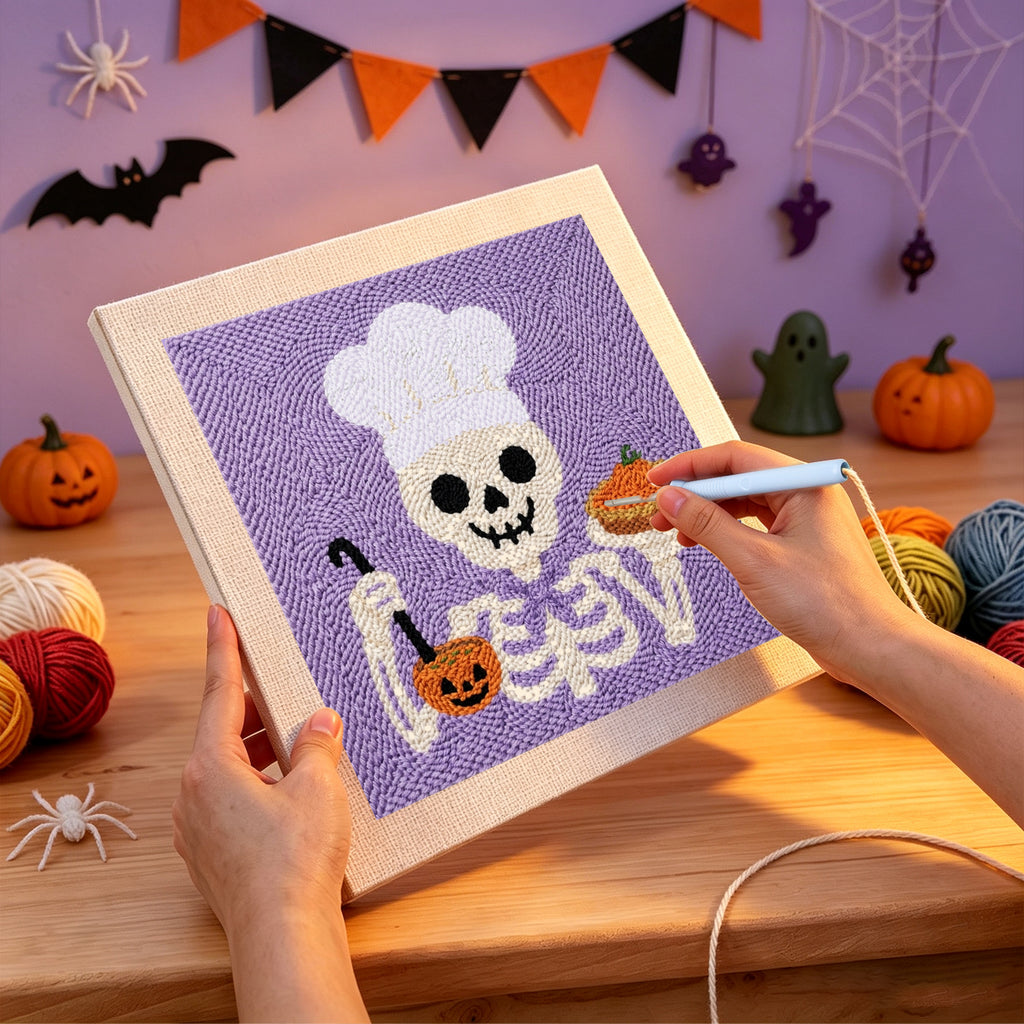 Punching the Skeleton Chef design with the punch needle