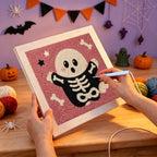 Punching the Skeleton Suit Ghost design with the punch needle