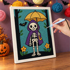 Punching the Skeleton with a Yellow Umbrella design with the punch needle