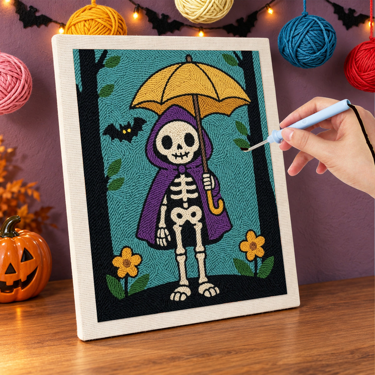 Punching the Skeleton with a Yellow Umbrella design with the punch needle