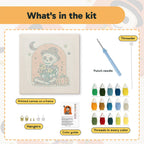 What is in the Skeleton with Bouquet kit: printed canvas, punch needle, threader, threads, color guide and hangers