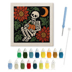 Skeleton with Pumpkin punch needle kit: finished canvas with threads, punch needle and threader