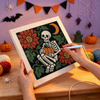 Punching the Skeleton with Pumpkin design with the punch needle