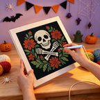 Punching the Skull and Floral Wreath design with the punch needle