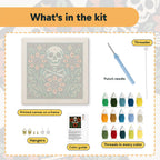 What is in the Skull and Sunflowers kit: printed canvas, punch needle, threader, threads, color guide and hangers
