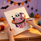 Punching the Skull Cupcake design with the punch needle