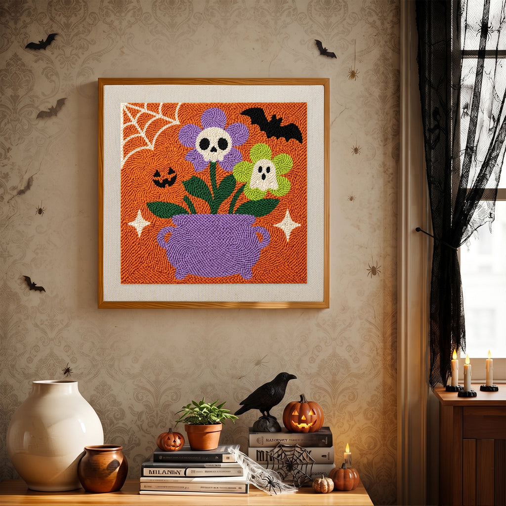 Finished Skull Flower Cauldron punch needle canvas on a wall