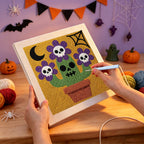 Punching the Skull Flower Pot design with the punch needle