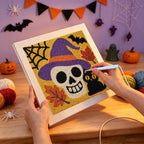 Punching the Skull in a Witch Hat design with the punch needle