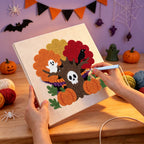 Punching the Skull Tree and Ghost design with the punch needle