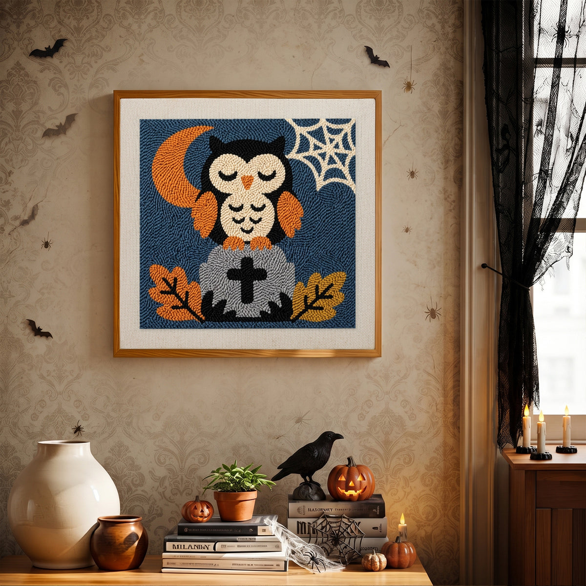 Finished Sleepy Graveyard Owl punch needle canvas on a wall