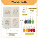 What is in the Smiley Snacks set, 8 × 12 in (20 × 30 cm) each: 4 printed canvases, punch needle, threader, threads, color guide and 4 sets of hangers