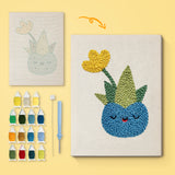 Smiling Blue Pot canvas before and after punching, with the threads and tools