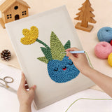 Punching the Smiling Blue Pot design with the punch needle
