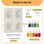 What is in the Smiling Blue Pots set, 8 × 12 in (20 × 30 cm) each: 4 printed canvases, punch needle, threader, threads, color guide and 4 sets of hangers