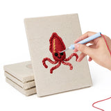 Hand punching one of the Smiling Sea Friends mini canvases