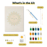 What is in the Smiling Sun kit: printed canvas, punch needle, threader, threads, color guide and hangers