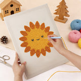 Punching the Smiling Sun design with the punch needle