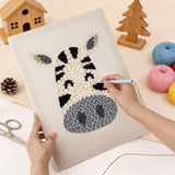 Punching the Smiling Zebra design with the punch needle