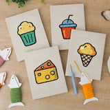 The four finished Snack Time Treats mini canvases laid out on a table