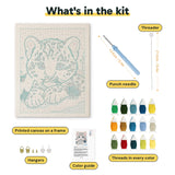 What is in the Snow Leopard Cub kit: printed canvas, punch needle, threader, threads, color guide and hangers
