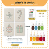 What is in the Snowman and Bauble set: 4 printed canvases, punch needle, threader, threads, color guide and 4 sets of hangers (6 × 8 in (15 × 20 cm) each)