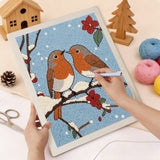 Punching the Snowy Robin Pair design with the punch needle