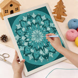 Punching the Soft Teal Mandala design with the punch needle