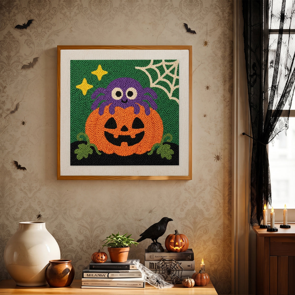 Finished Spider on a Pumpkin punch needle canvas on a wall