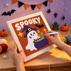 Punching the Spooky Brew Ghost design with the punch needle