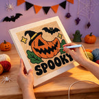 Punching the Spooky Pumpkin Grin design with the punch needle